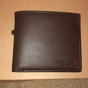 Brand new never used coach wallet! Brown leather